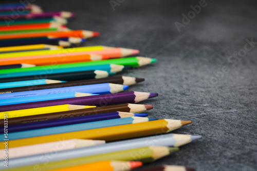 pencils on black background