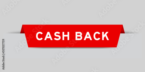 Red color inserted label with word cash back on gray background