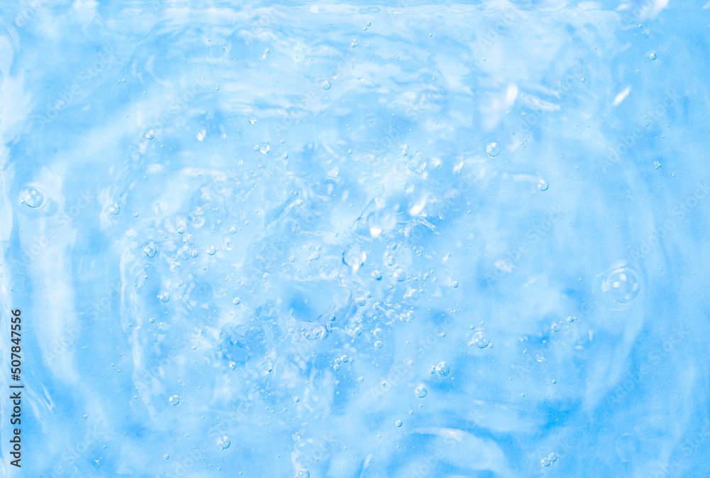Blue water background. Summer blue wave. Abstract or natural wavy water texture background. Defocus