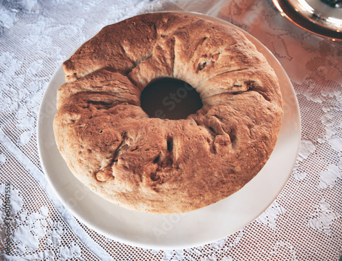 Close up of a typical italian festive Easter recipe, a stuffed baked bread called Casatiello, with ha and cheese and salami inside. Italian tasty and savory specialty from Naples. photo