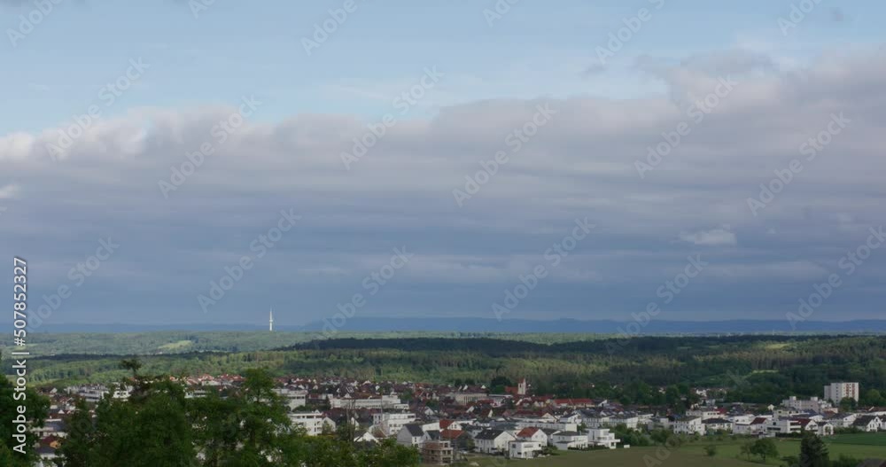 Timelapse of clouds above rural town in Stuttgart Germany at noon, Baden Wurttemberg, Balvaria Europe Timelapse of clouds above rural town in Stuttgart Germany at noon, Baden Wurttemberg, Balvaria Europe