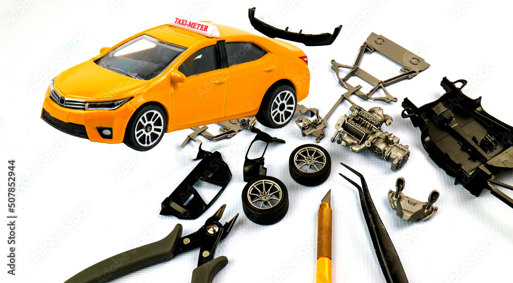 Assemble car plastic model for hobbyists , Hobby and leisure at home in quarantine. Assemble car plastic model for hobbyists , Hobby and leisure at home in quarantine.