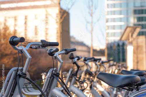 Parking with bicycles for rent on sunny day