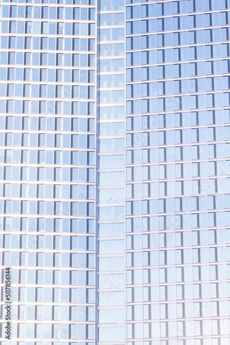 Blurred view of modern building on sunny day