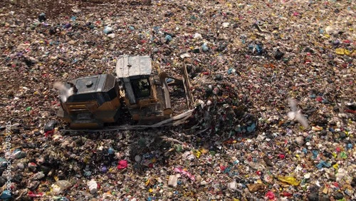 Wallpaper Mural Aerial view of a large pile of plastic bags in a large pile of mountain waste. Landfilling of waste. Torontodigital.ca