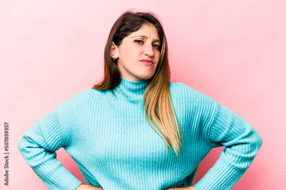 Young caucasian woman isolated on pink background sad, serious face, feeling miserable and displeased. Young caucasian woman isolated on pink background sad, serious face, feeling miserable and displeased.