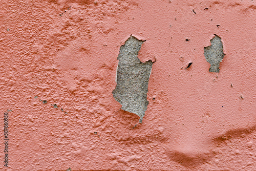 Wall paint that peels off and wears off.