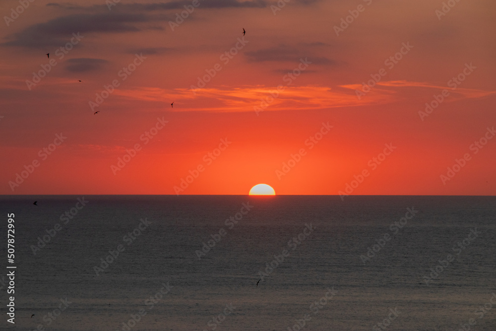 Landscape of a sunset on the coast in summer