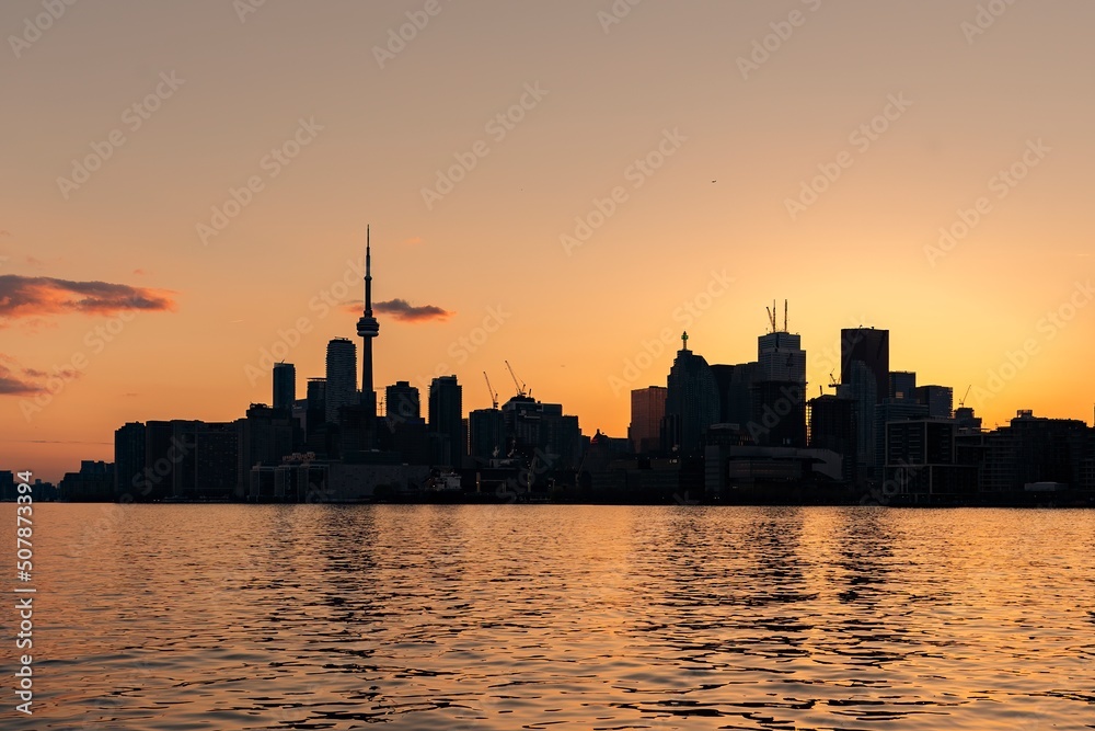 Toronto s skyline at dusk as seen from Polson Pier