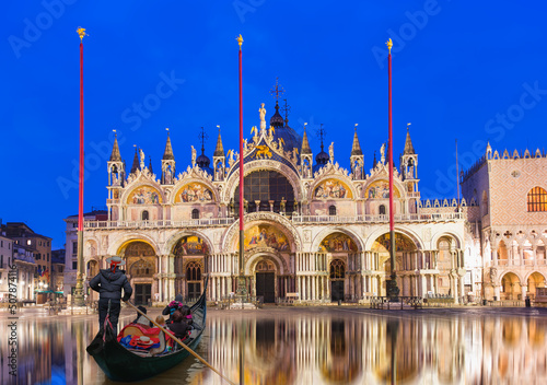 San Marco's Basilica - San Marco square with Campanile - Venetian gondolier punting gondola - Venice, ITALY