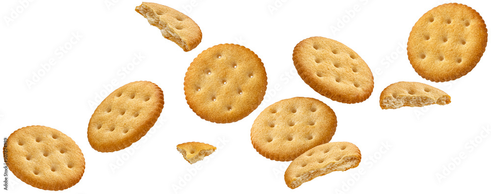 Falling round cheese crackers isolated on white background Falling round cheese crackers isolated on white background
