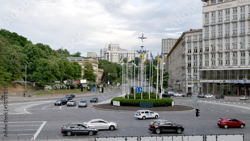 Ukrainian national flag at the European square in Kyiv  is unfolding in the wind 