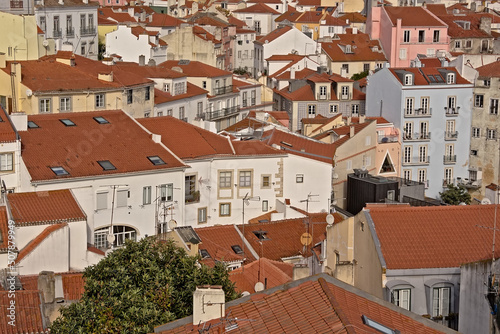 High angle view on traditional houses with orange tiled roofs in Alfama district, Lisbon, Portugal 