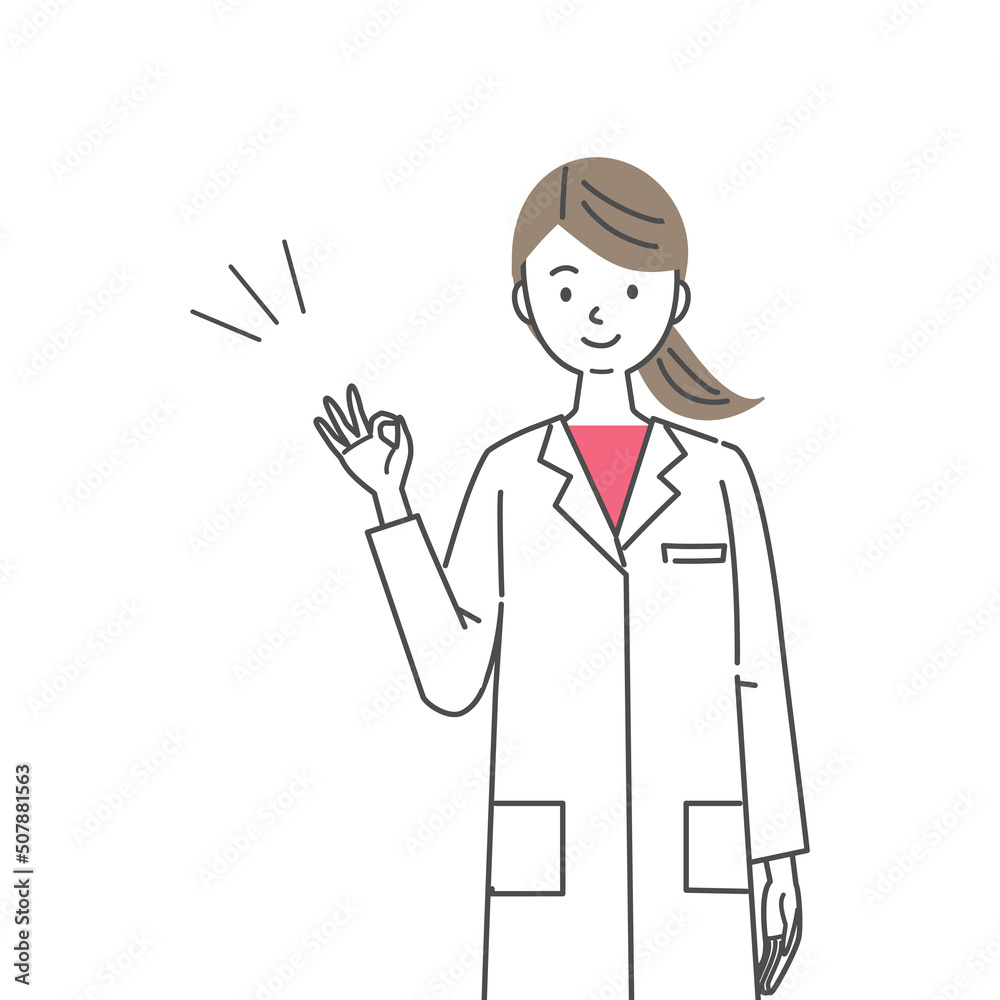 指でOKサインを出す白衣の女性