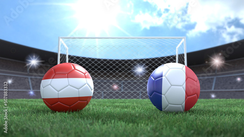 Two soccer balls in flags colors on stadium blurred background. Austria and France. 3d image