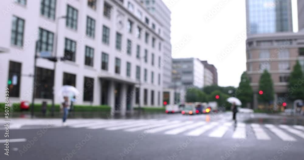 Walking people on the street in Marunouchi Tokyo rainy day Walking people on the street in Marunouchi Tokyo rainy day