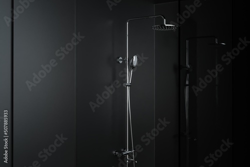 Shower on black wall. The concept of the bathroom, taking care of personal hygiene. Minimalistic style. Shower in the bathroom. 3d render, 3d illustration.
