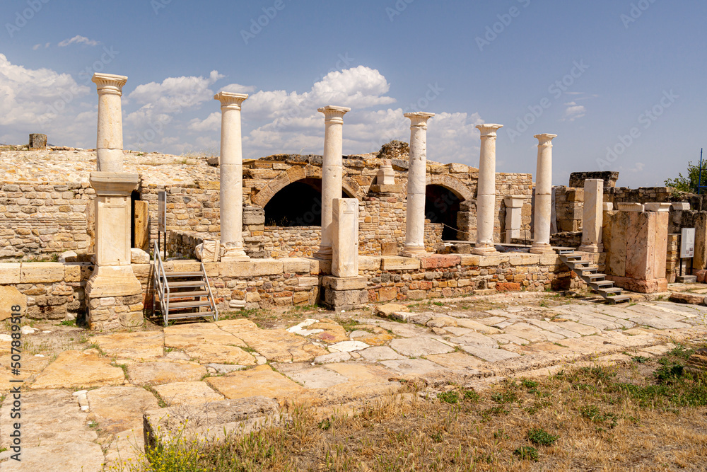 It is known in the sources that the first name of Tripolis was Apollonia and later it was called Tripolis in the Late Hellenistic Period.