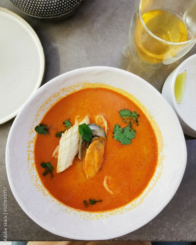 Tom yum soup in a cafe. View from above. Thai food. Tom yum soup in a cafe. View from above. Thai food.
