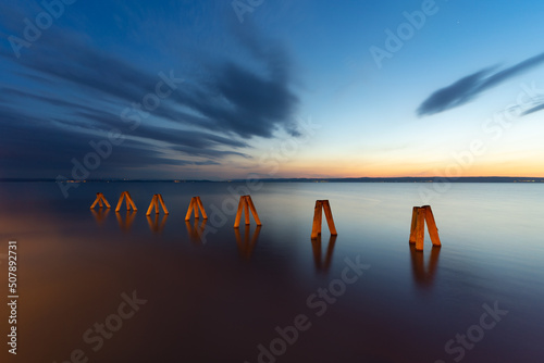 Obraz na płótnie Lighthouse at Lake Neusiedl, Podersdorf am See, Austria. Lighthouse after sunset w salonie