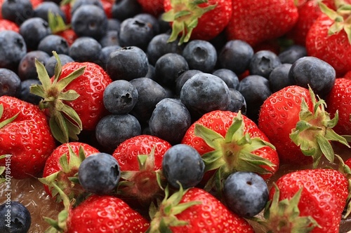 Strawberries and blueberries in a basket