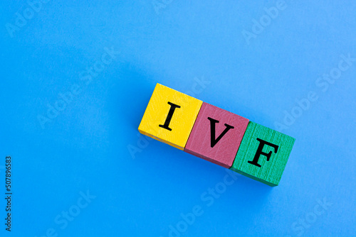IVF - In Vitro Fertilization acronym on colorful wooden block cubes photo