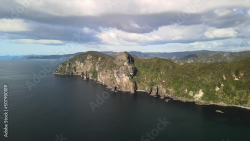 Flying over clifftops in New Zealand's Bay of Islands