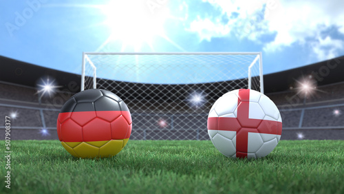 Two soccer balls in flags colors on stadium blurred background. Germany and England. 3d image