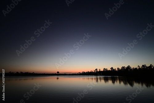 Twilight over Pine Glades Lake in Everglades National Park  Florida on calm clear April evening.