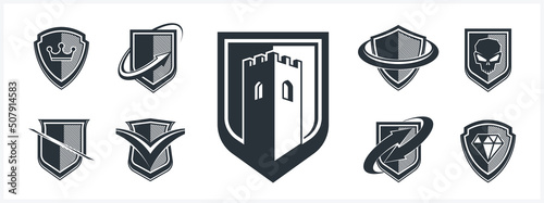 Classic shields shapes set with different additional elements vector symbols set, defense and safety icons, ammo emblems collection.