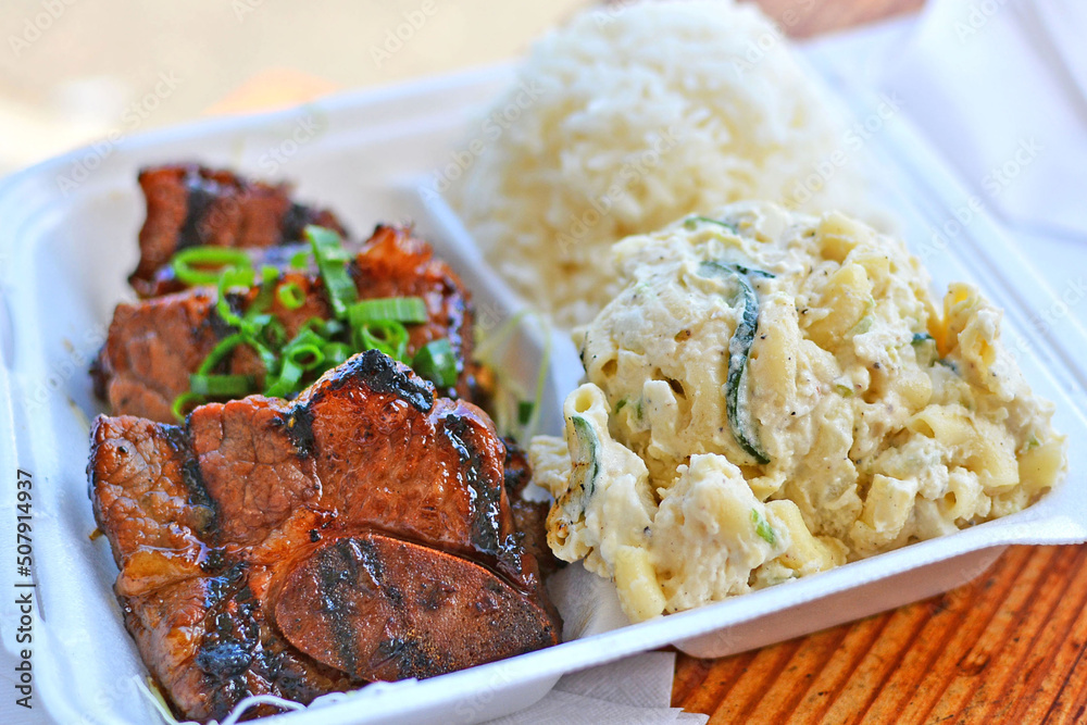 Korean style kalbi beef short ribs with white rice and macaroni salad