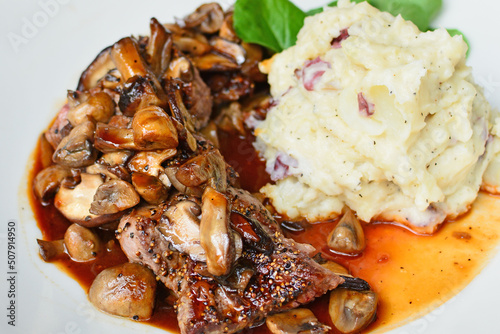 Steak diane with mushrooms and mashed potatoes photo