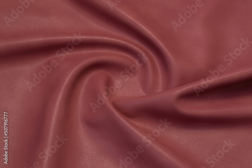 coral artificial leather with waves and folds on PVC base