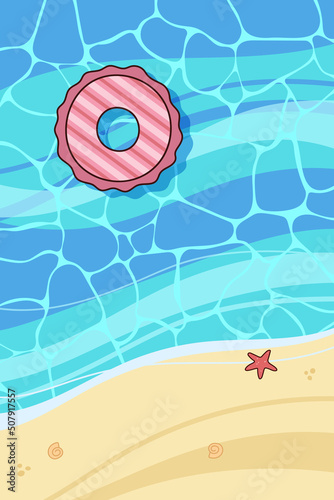 Summer beach. Floating rubber ring on waves. Top view.