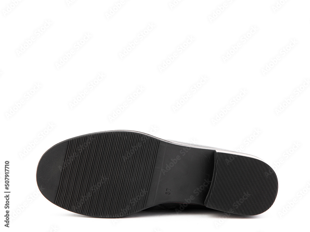 Sole for shoes, bottom view. Shoe sole close-up isolated on white background. place for text. Element of boots. Concept of production of shoe. Sole for shoes, bottom view. Shoe sole close-up isolated on white background. place for text. Element of boots. Concept of production of shoe.
