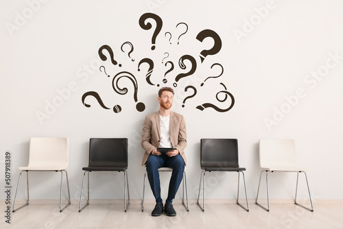Young man waiting for job i...