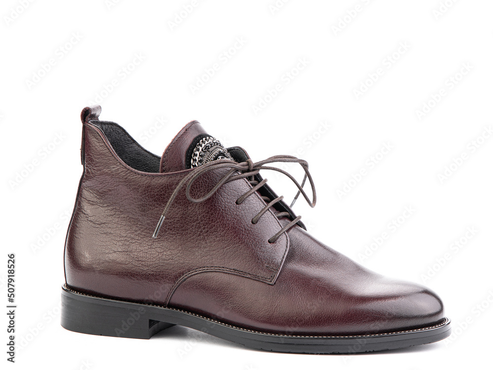 Men's autumn brown leather jodhpur boots with laces and average heels, isolated white background. Right side view. Fashion shoes. Men's autumn brown leather jodhpur boots with laces and average heels, isolated white background. Right side view. Fashion shoes.