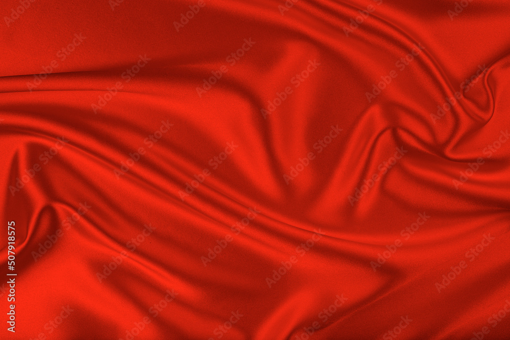 Obraz premium Closeup of rippled red silk fabric. White silk fabric as an abstract background.