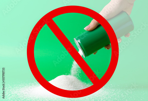 Woman pouring sugar from ti...