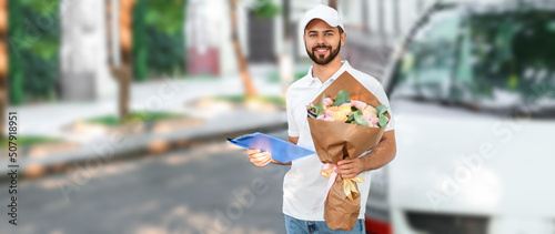 Delivery man with bouquet o...