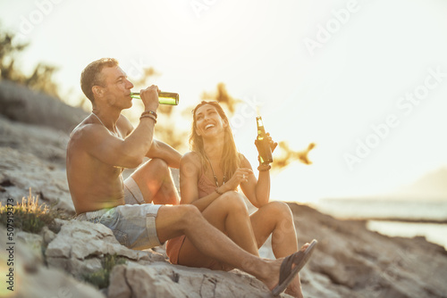 Couple Enjoying A Summer Vacation At The Beach © milanmarkovic78