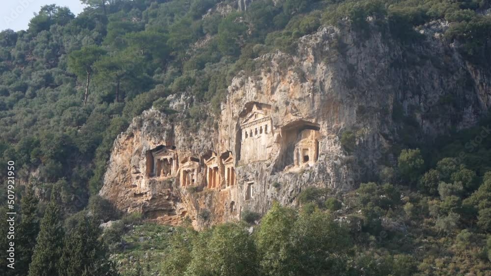 View Of The Famous UNESCO Site Ancient Lycian Tombs In Rocks (Kaunos, Turkey) View Of The Famous UNESCO Site Ancient Lycian Tombs In Rocks (Kaunos, Turkey)