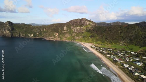 Sunset flight over Taupo Bay in New Zealand's Northland