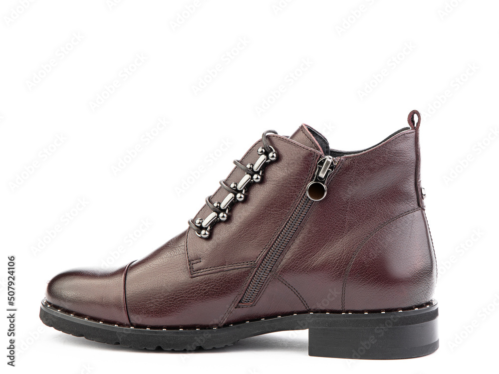 Men's autumn brown leather jodhpur boots with laces and average heels, isolated white background. Left side view. Fashion shoes. Men's autumn brown leather jodhpur boots with laces and average heels, isolated white background. Left side view. Fashion shoes.
