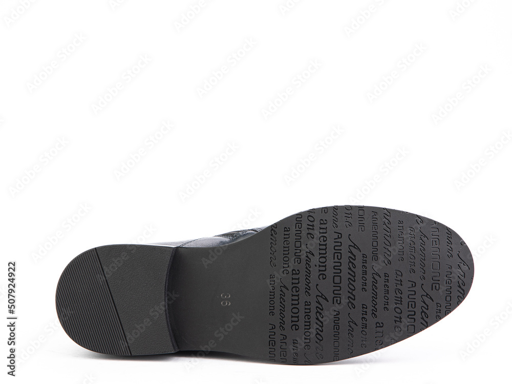 Sole for shoes, bottom view. Shoe sole close-up isolated on white background. place for text. Element of boots. Concept of production of shoe. Sole for shoes, bottom view. Shoe sole close-up isolated on white background. place for text. Element of boots. Concept of production of shoe.