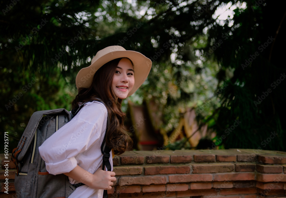 Asian woman traveling to Wat Phra That Doi Suthep in Chiang Mai, Thailand