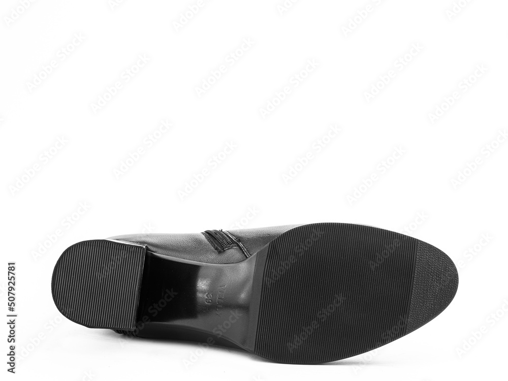 Sole for shoes, bottom view. Shoe sole close-up isolated on white background. place for text. Element of boots. Concept of production of shoe. Sole for shoes, bottom view. Shoe sole close-up isolated on white background. place for text. Element of boots. Concept of production of shoe.