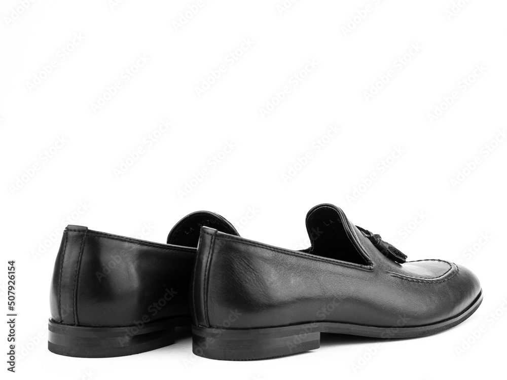 Vintage Men's Loafer Shoes. Closeup. Advertising shot. Leather shoes. Concept closeup shoes. Isolated object close up on white background.