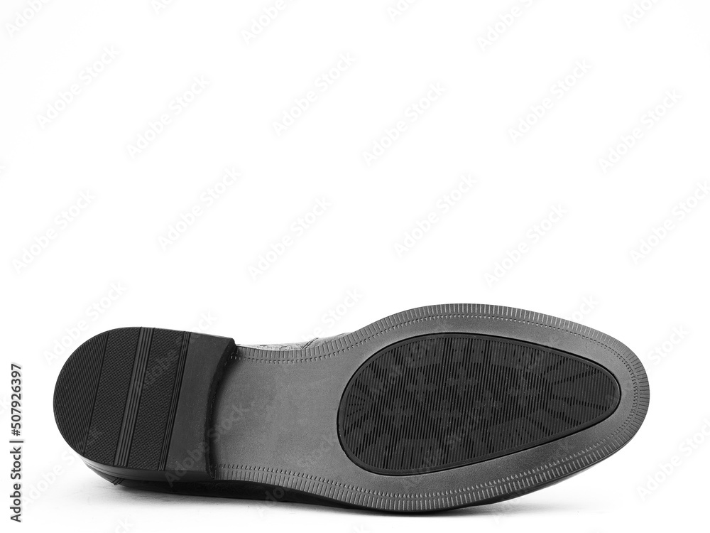 Sole for shoes, bottom view. Shoe sole close-up isolated on white background. place for text. Element of boots. Concept of production of shoe. Sole for shoes, bottom view. Shoe sole close-up isolated on white background. place for text. Element of boots. Concept of production of shoe.