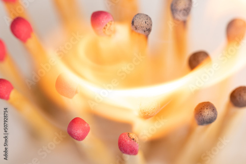 Group of matchsticks burning. © Roger